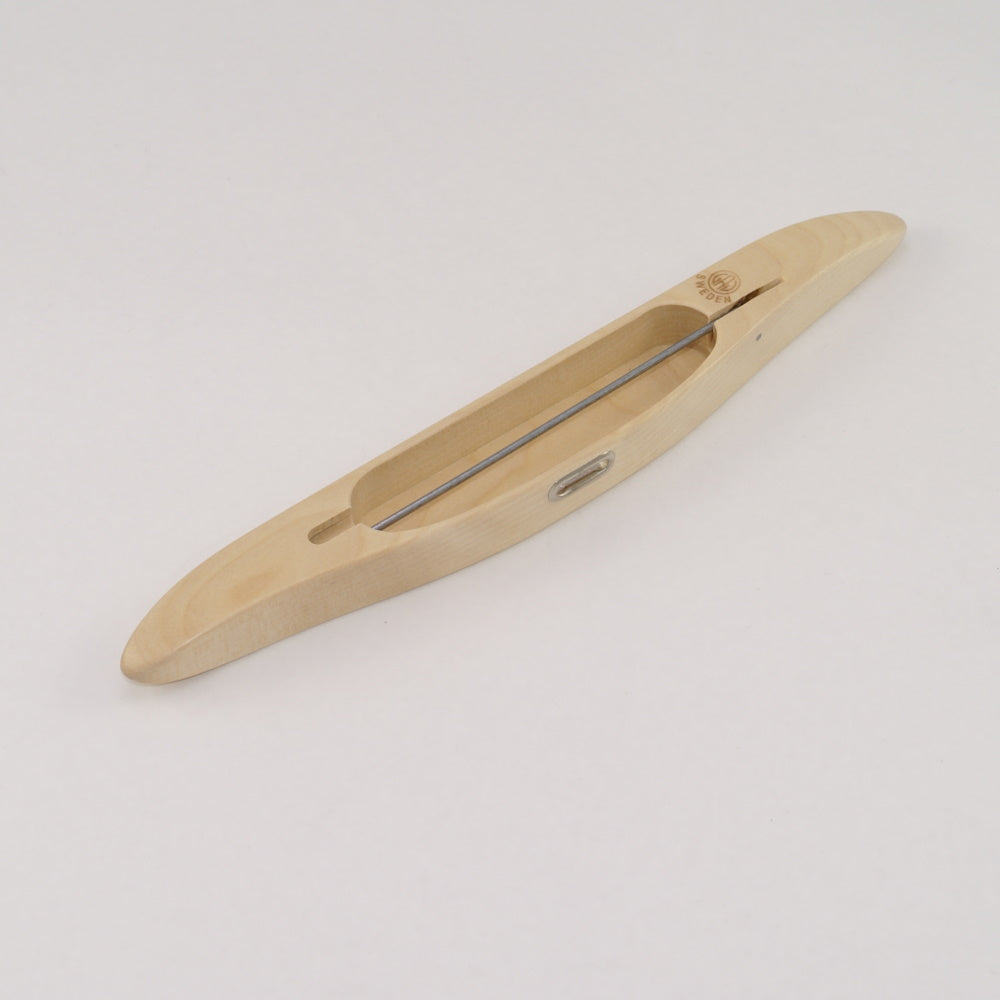 Weaving shuttle made of birch wood